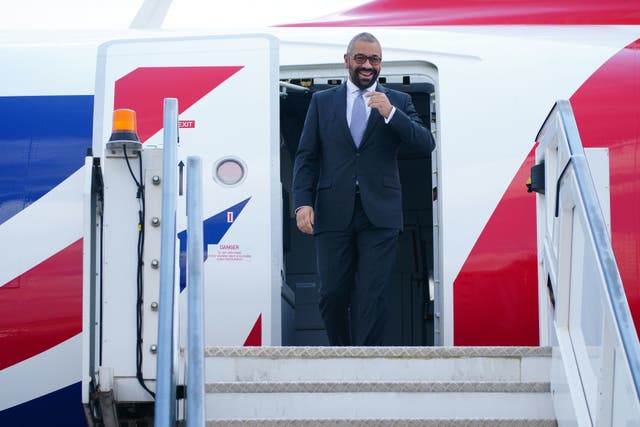 <p>Home Secretary James Cleverly arrives at Kigali International Airport in Rwanda</p>